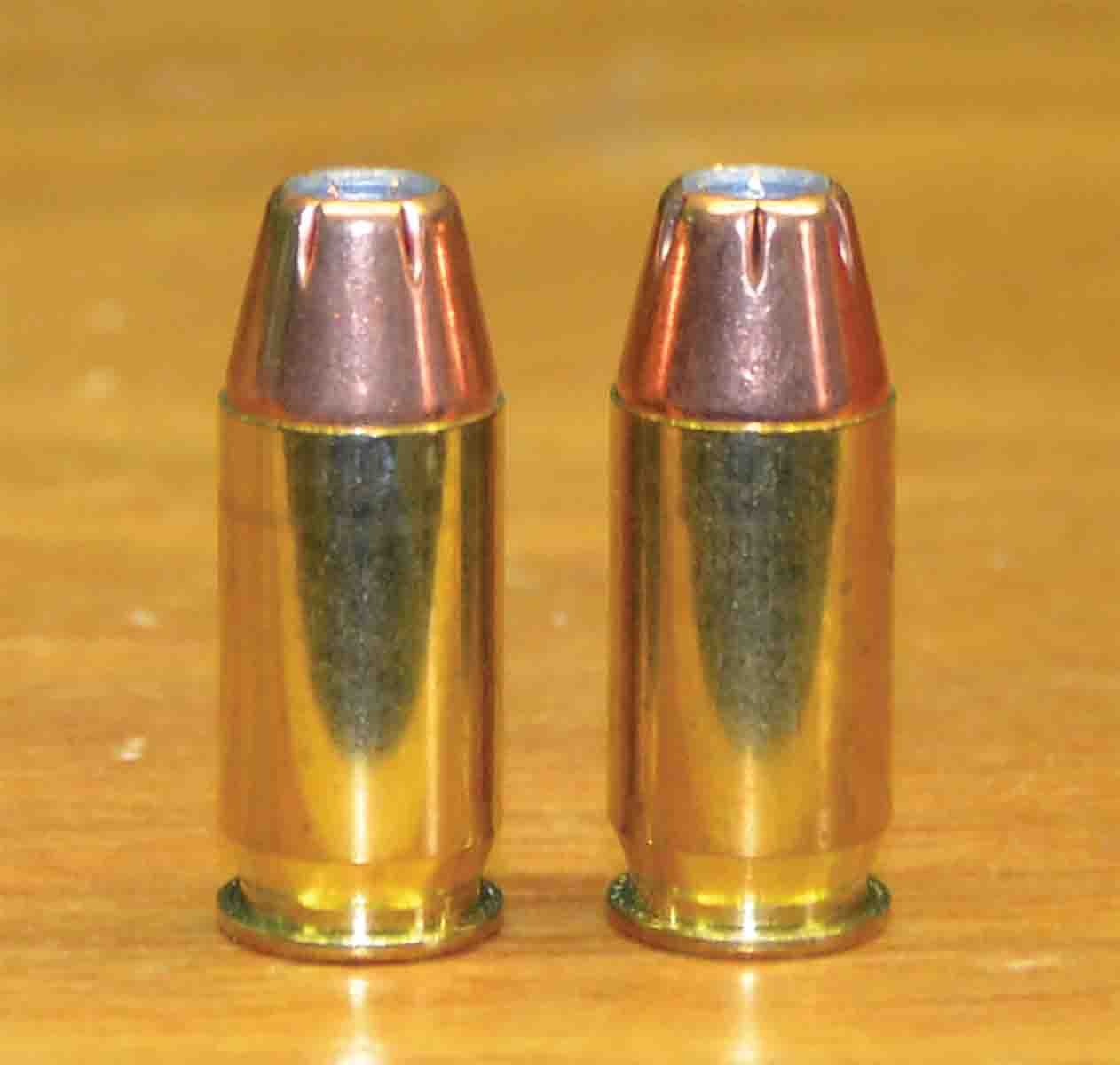 When the .45 Super (left) and the .45 ACP (right) are loaded with the same bullet, in this case, the Hornady 200-grain XTP, they look the same because externally they are the same. Only looking at their headstamps will reveal which is which. Accidentally filling a .45 ACP case with a .45 Super load would not be good and keeping them separate in the loading room and at the range is extremely important.
